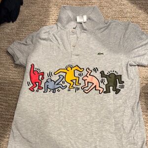 Lacoste Kids Polo with Keith Haring Vibrant Graphic Design